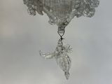 a glass chandelier hanging from the ceiling
