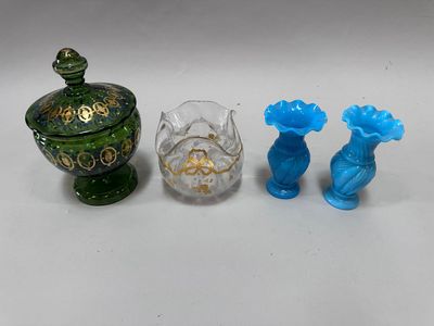 three vases that are sitting next to each other on a table