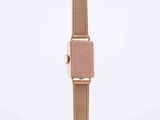 a close up of a watch on a white background