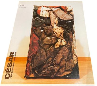 a picture of a book with a pile of shoes on it