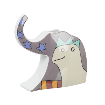 une figurine d'éléphant avec une étoile sur la tête