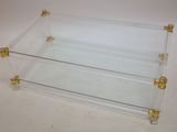 clear glass and brass coffee table with two shelves