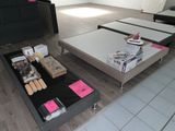 a coffee table that has a lot of food on it