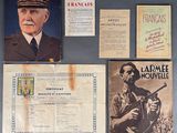some old military memorabilias are on display on a table