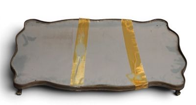 a glass tray with a gold ribbon on it