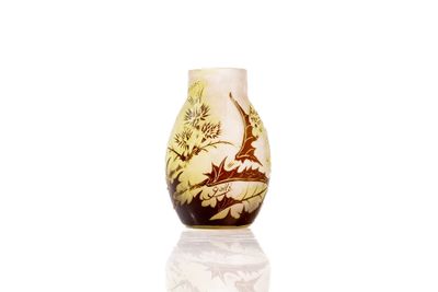 a vase that has a picture of a bird on it