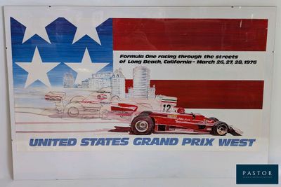 a poster of a race car on display in a museum