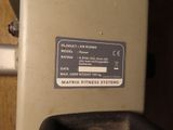 a label on the side of a machine that says matrix fitness systems