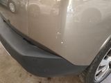 a close up of the front bumper of a car