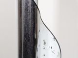 a glass vase with a spiral design on it