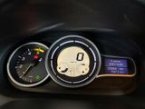 a close up of a car dashboard with a speedometer