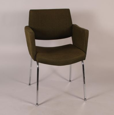 an image of a brown chair with chrome legs