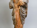a statue of a woman holding a bird in her hand