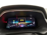 the dashboard of a car with a digital display on it