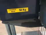 a picture of a machine that has a sign on it