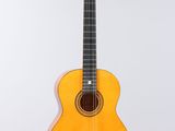 a guitar hanging on a wall with a white background