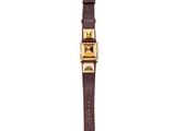 a brown watch with a gold buckle and a brown strap