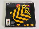 the cd case has a yellow and black chevron pattern on it