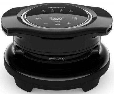 une image représentant une enceinte noire surmontée d'une horloge