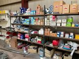 many boxes and boxes on the shelves in the garage