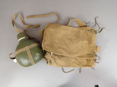 two bags that are sitting on a table