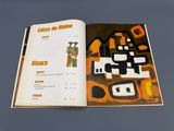 an open book with a picture of a robot on it