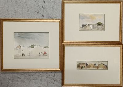 three framed watercolor paintings of a beach scene with people on the beach