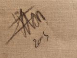 an image of a close up of a piece of cloth with writing on it