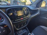 the interior of a car with a dashboard and steering controls