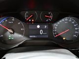 a close up of a car dashboard with a speedometer