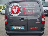 a van that is parked in a parking lot