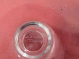 a glass of water sitting on top of a table