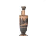 an image of a black and brown vase on a wooden base