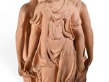 a statue of two women standing next to each other