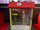 a machine that is sitting on a table in a room