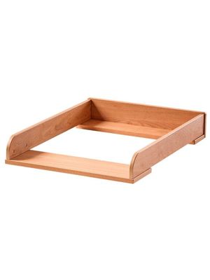 a close up of a wooden tray on a white background