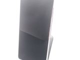 a cell phone that is sitting on top of a stand
