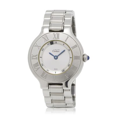 a close up of a wrist watch with roman numerals on it