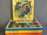 a stack of children ' s books sitting on top of each other
