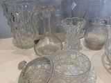 a lot of glass items sitting on a table