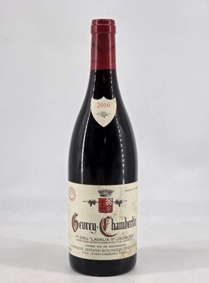 a bottle of wine that is sitting on a table