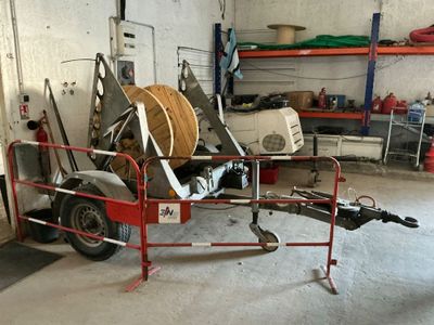an image of a motorcycle being worked on in a garage