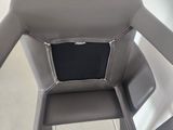 a chair that is sitting in the middle of a room