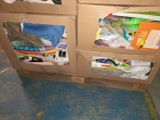 a cardboard box that has a bunch of items inside of it