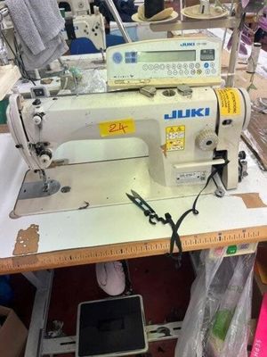 a sewing machine that is sitting on a table