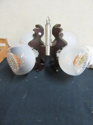 two lamps that are sitting on a table