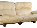 a couch that is sitting on a white background