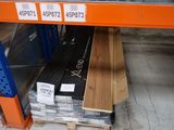 a lot of different types of wood on the shelves