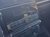 a picture of a car dashboard with a radio in it