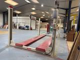 an image of a warehouse with a lot of equipment in it